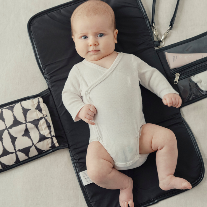 How to Change a Baby’s Nappy on a Plane (Step-by-Step Guide)