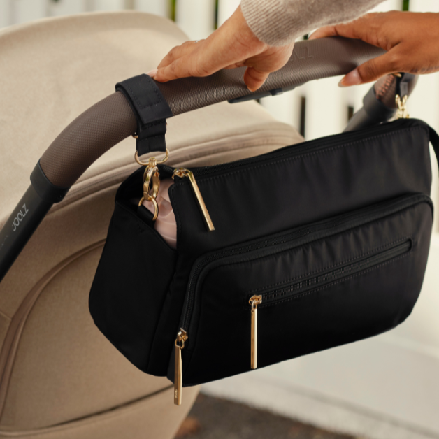 What’s the Difference Between the OiOi Multitasker Pram Caddy and the New 2.0 Version?