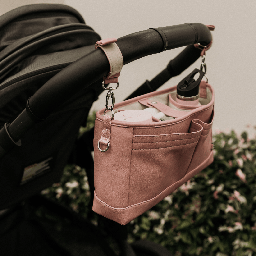 Nappy bag top pram straps