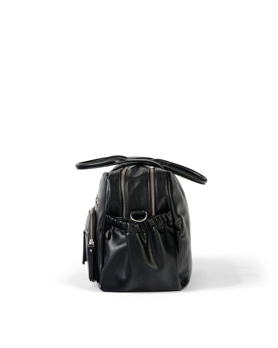 Side of the OiOi Faux Leather Carry All Nappy Bag in Black